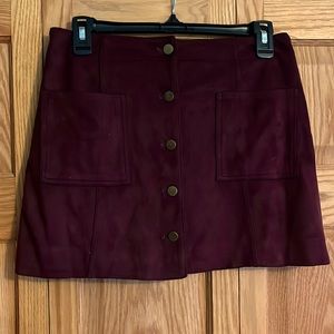 Suede buttoned skirt